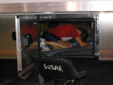 Station 17: If you take Susan's picture vacuuming inside the bays, warn her before the flash goes off!